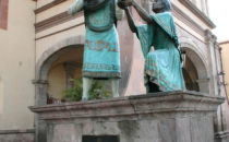 Statue of a musician in front of Templo de la Santa Cruz, Querétaro, Mexico