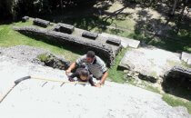 Climbing a temple in Lamanai, Belize